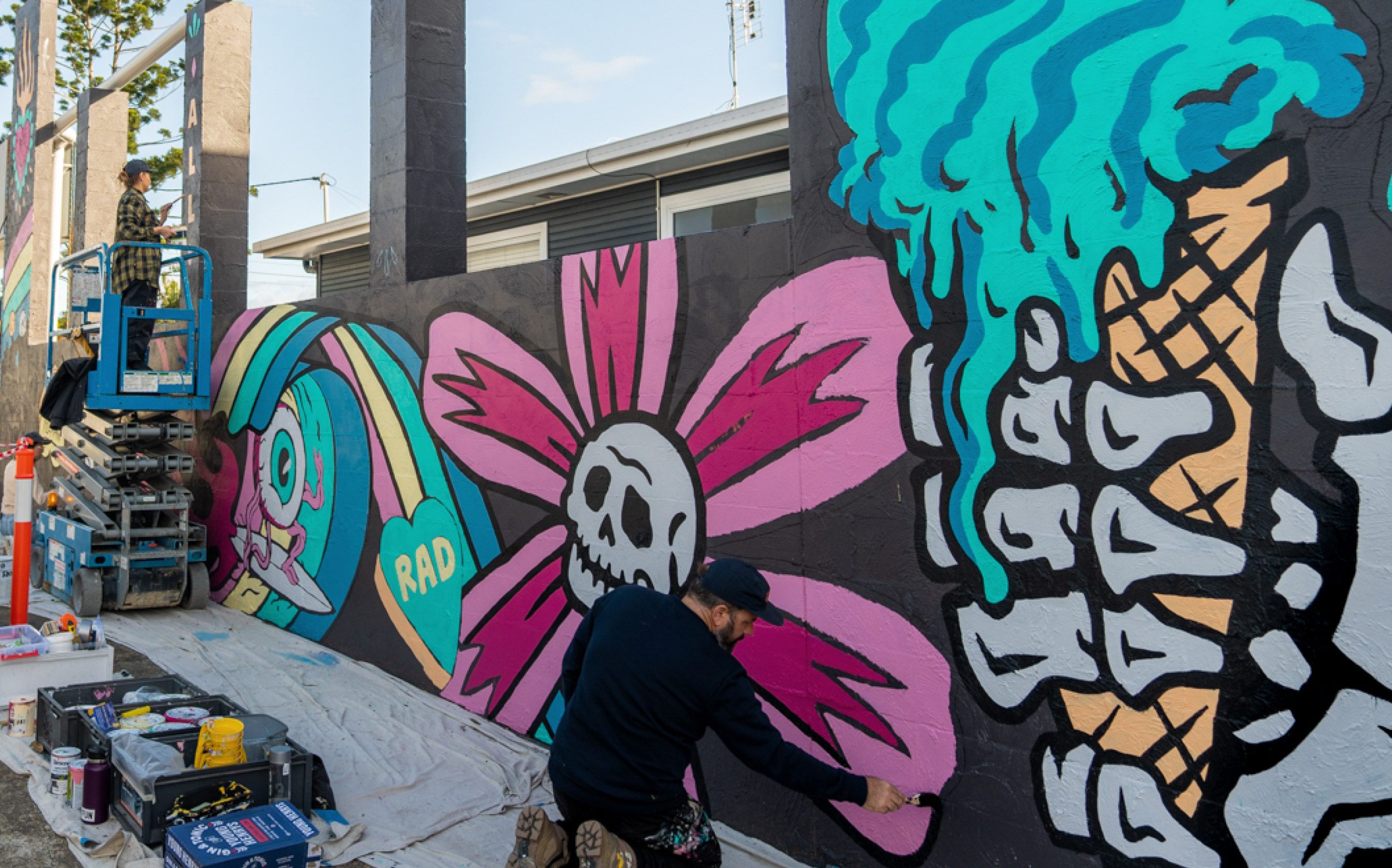 Surface Festival Artist Kiel Tillman paints his wall with Bianca Taylor-Andrews assisting