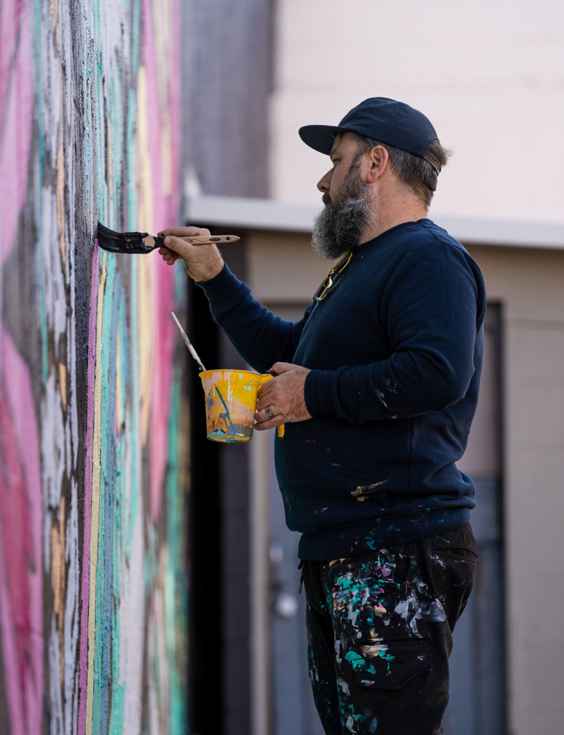Up-close-painting-a-mural-for-Miami-Street-Art-Festival